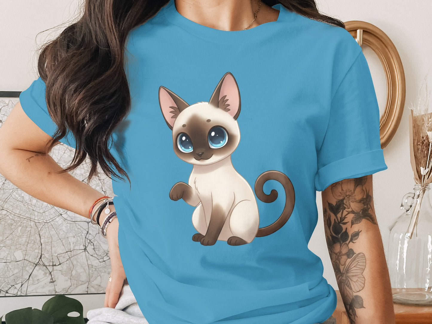 Cute Blue Eyed Cartoon Siamese Cat on Blue Shirt