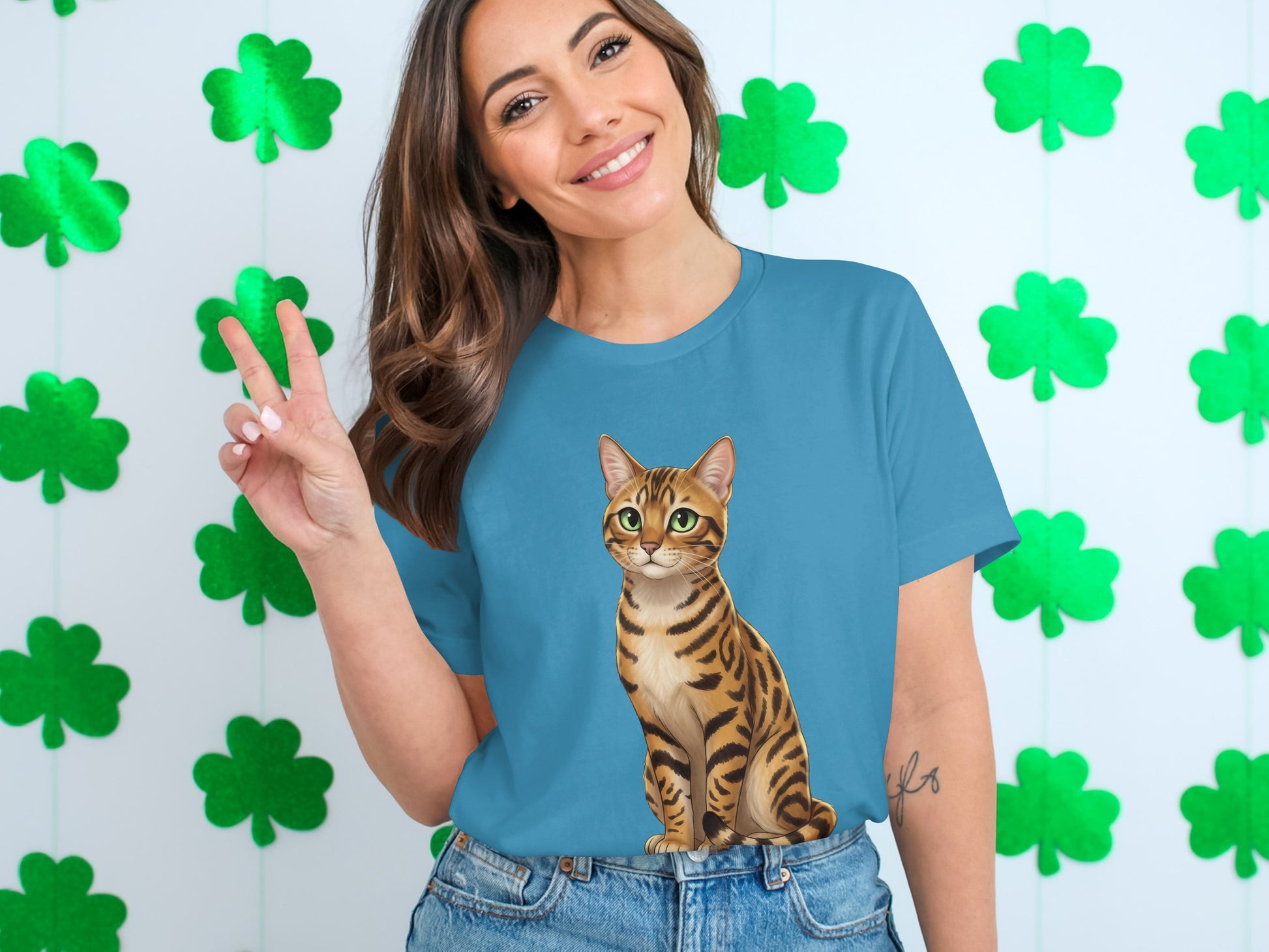 Cute Cat Graphic T-Shirt with Green Shamrock Background