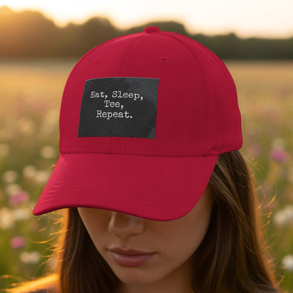 Eat Sleep Tee Repeat Red Hat with a Slogan